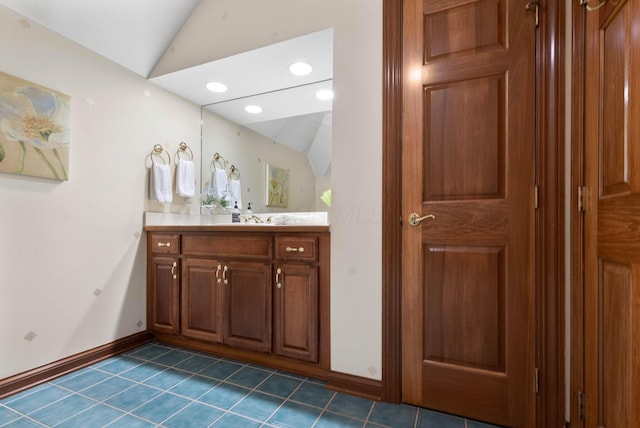 5232 Lola Way, Columbus, OH 43235 - bathroom with lofted ceiling, vanity, tile patterned flooring, and recessed lighting