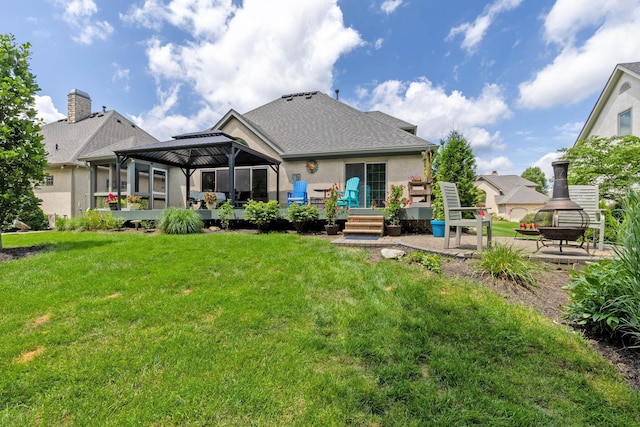 5232 Lola Way, Columbus, OH 43235 - rear view of property with a gazebo, a deck, a yard, stucco siding, and a patio area
