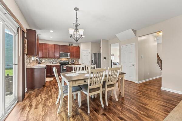 3810 Winding Path Dr, Canal Winchester, OH 43110 - dining space featuring a chandelier, dark wood-style flooring, and recessed lighting