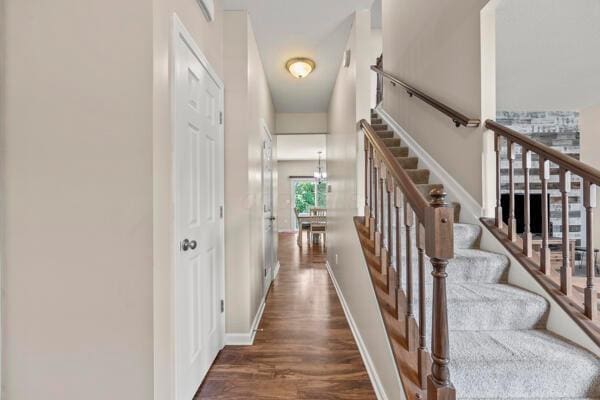 3810 Winding Path Dr, Canal Winchester, OH 43110 - hallway with wood finished floors and stairway