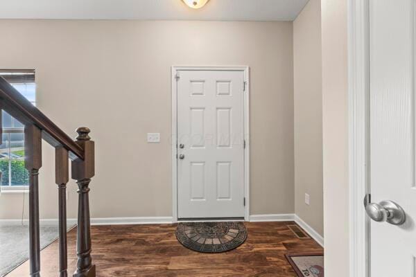 3810 Winding Path Dr, Canal Winchester, OH 43110 - foyer entrance featuring wood finished floors and stairway