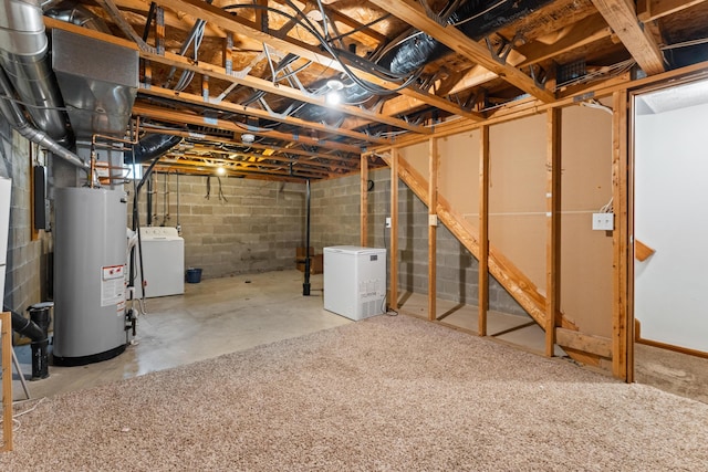 5692 Palos Ln Unit 168D, Hilliard, OH 43026 - unfinished basement with gas water heater, washer / clothes dryer, fridge, and concrete block wall
