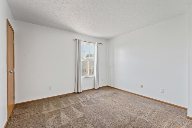 5692 Palos Ln Unit 168D, Hilliard, OH 43026 - carpeted spare room with baseboards and a textured ceiling