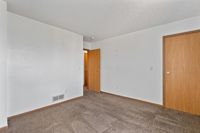 5692 Palos Ln Unit 168D, Hilliard, OH 43026 - carpeted spare room with baseboards