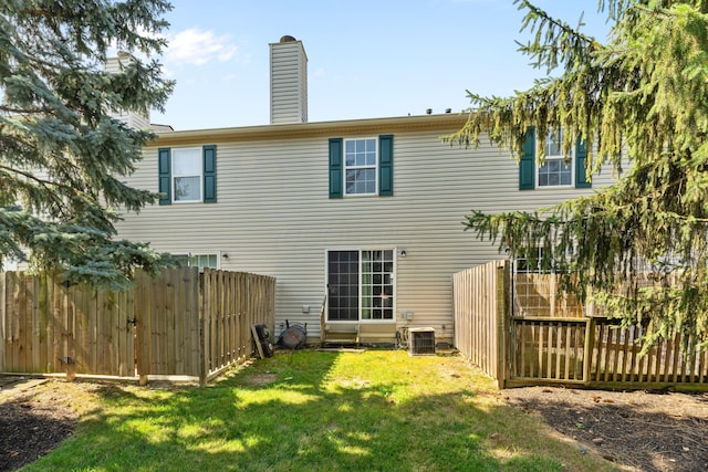 5692 Palos Ln Unit 168D, Hilliard, OH 43026 - back of house featuring a chimney