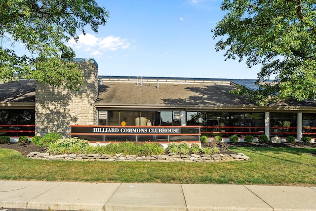 5692 Palos Ln Unit 168D, Hilliard, OH 43026 - view of front of property with a shingled roof and a front lawn