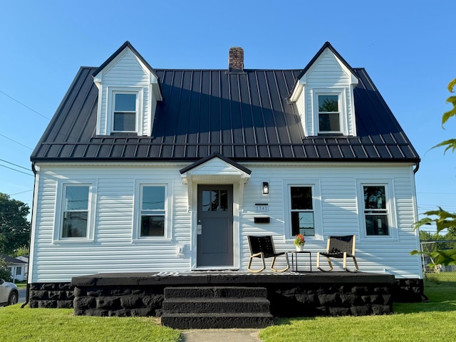 1341 Washington Ave, Washington Court House, OH 43160 - view of front facade with a chimney, a standing seam roof, and a metal roof