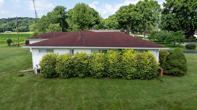 2052 Lorimer Dr NE, Newark, OH 43055 - view of home's exterior with a lawn