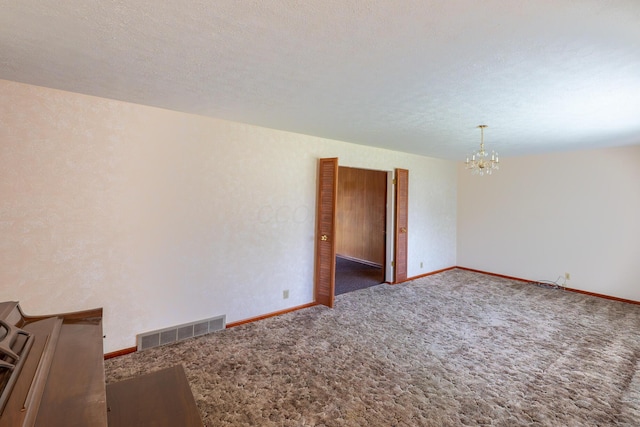 2052 Lorimer Dr NE, Newark, OH 43055 - unfurnished room with a chandelier and carpet floors
