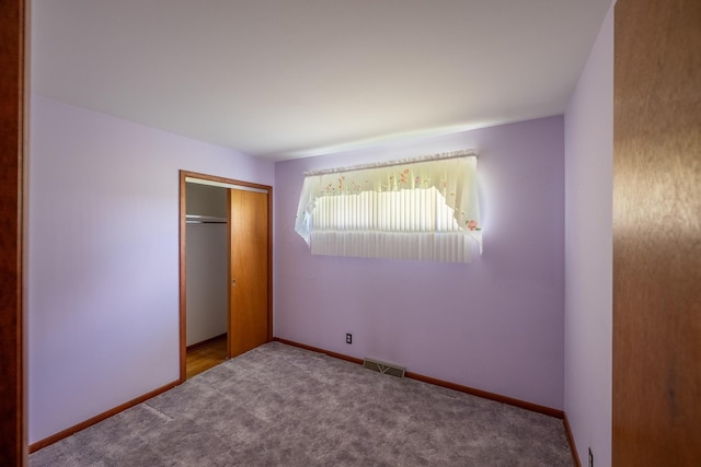 2052 Lorimer Dr NE, Newark, OH 43055 - unfurnished bedroom with carpet flooring and a closet