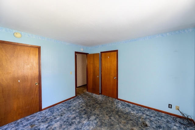 2052 Lorimer Dr NE, Newark, OH 43055 - unfurnished bedroom with a closet and carpet
