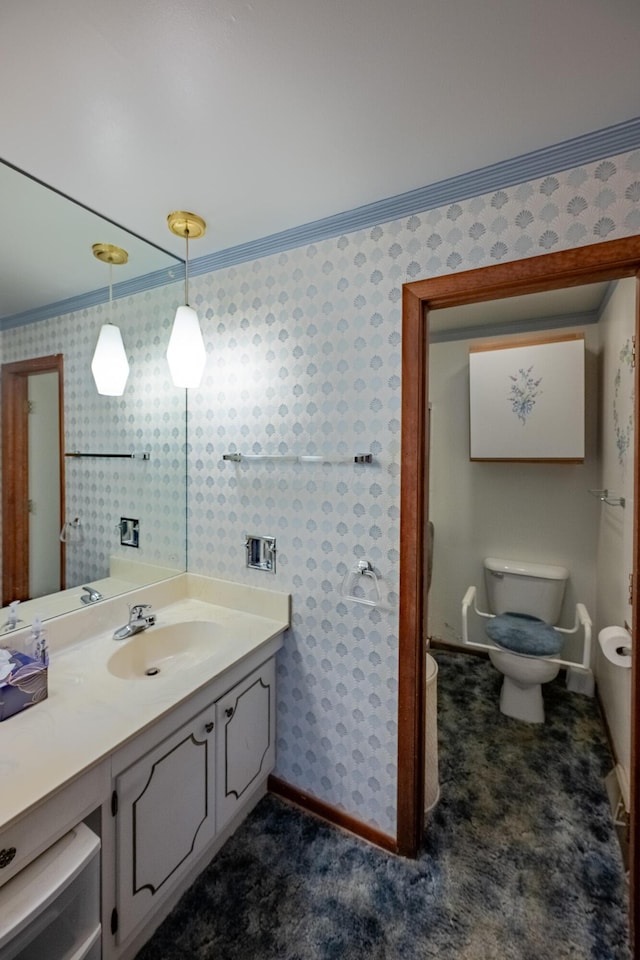 2052 Lorimer Dr NE, Newark, OH 43055 - bathroom with vanity, crown molding, and wallpapered walls