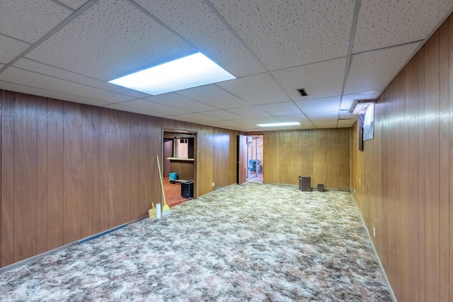 2052 Lorimer Dr NE, Newark, OH 43055 - finished below grade area featuring wooden walls, a paneled ceiling, and carpet flooring