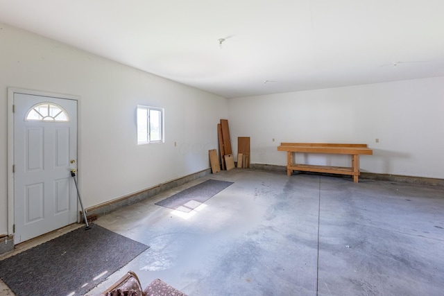 2052 Lorimer Dr NE, Newark, OH 43055 - garage featuring baseboards
