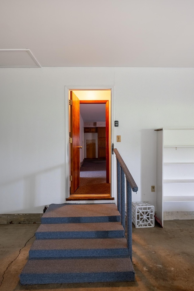 2052 Lorimer Dr NE, Newark, OH 43055 - staircase featuring unfinished concrete flooring
