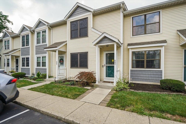 907 Soramill Ln Unit 8E, Columbus, OH 43085 - view of property featuring uncovered parking
