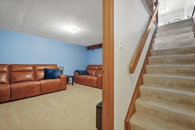 907 Soramill Ln Unit 8E, Columbus, OH 43085 - carpeted living area featuring stairway