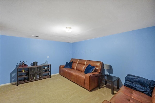 907 Soramill Ln Unit 8E, Columbus, OH 43085 - living area with carpet floors and baseboards