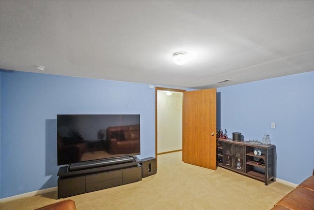 907 Soramill Ln Unit 8E, Columbus, OH 43085 - carpeted living room with baseboards