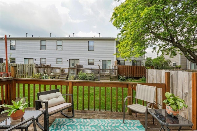 907 Soramill Ln Unit 8E, Columbus, OH 43085 - wooden deck featuring a fenced backyard
