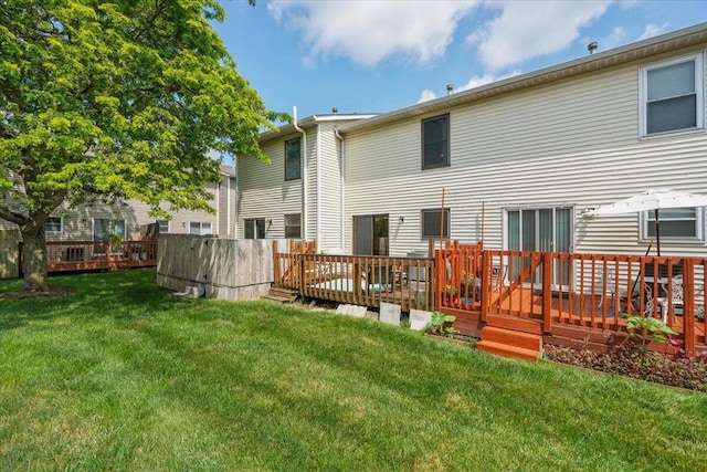 907 Soramill Ln Unit 8E, Columbus, OH 43085 - back of house with a wooden deck