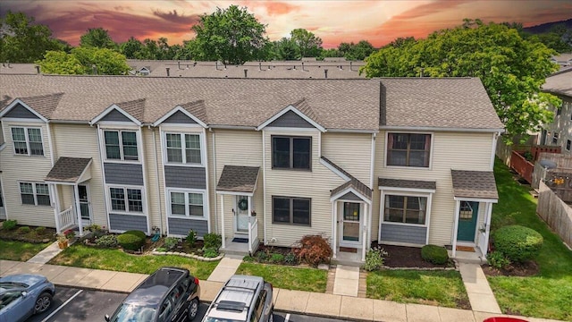 907 Soramill Ln Unit 8E, Columbus, OH 43085 - multi unit property featuring roof with shingles, uncovered parking, and entry steps
