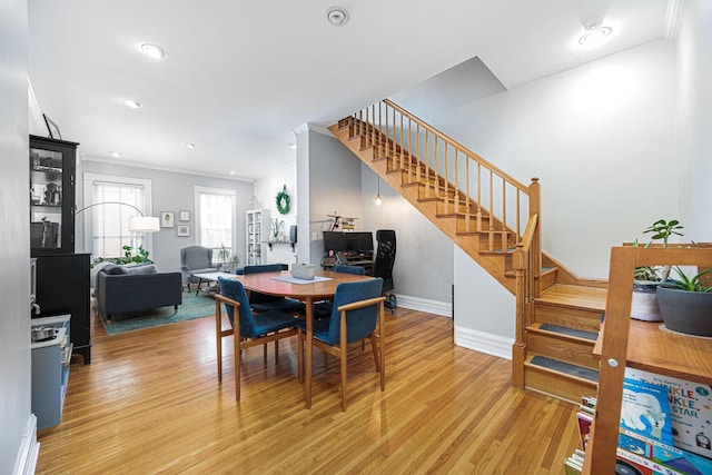 133 E Sycamore St, Columbus, OH 43206 - dining area featuring light wood-style flooring, stairway, and recessed lighting