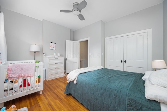 133 E Sycamore St, Columbus, OH 43206 - bedroom with wood finished floors, a closet, and ceiling fan