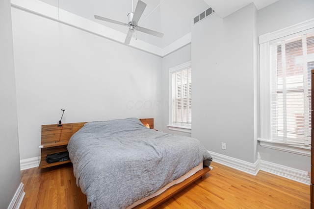 133 E Sycamore St, Columbus, OH 43206 - bedroom with wood finished floors and a ceiling fan