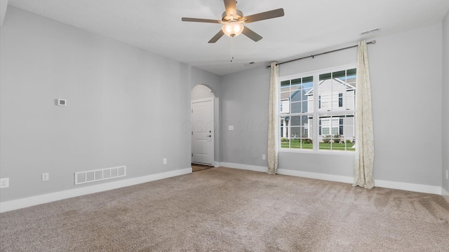 1968 Highbridge St, Newark, OH 43055 - carpeted spare room featuring arched walkways and ceiling fan