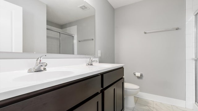 1968 Highbridge St, Newark, OH 43055 - bathroom featuring a shower stall, marble finish floors, and double vanity