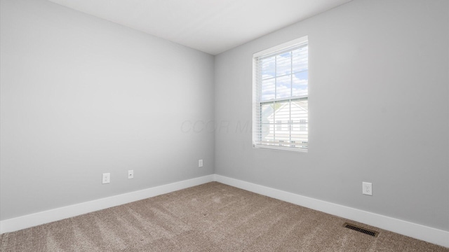 1968 Highbridge St, Newark, OH 43055 - empty room with carpet flooring and baseboards