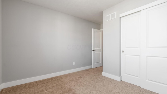 1968 Highbridge St, Newark, OH 43055 - unfurnished bedroom featuring light carpet and a closet