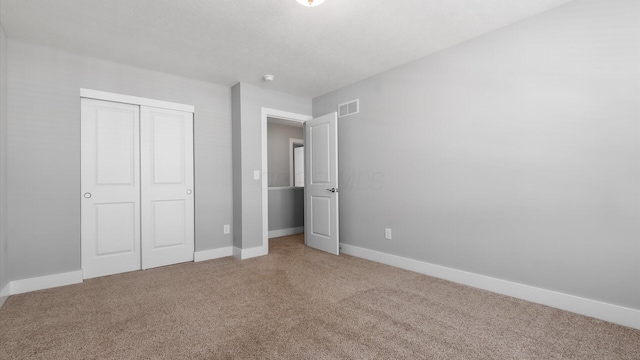 1968 Highbridge St, Newark, OH 43055 - unfurnished bedroom with carpet flooring and a closet