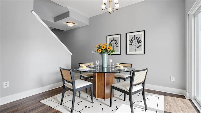 1968 Highbridge St, Newark, OH 43055 - dining room featuring wood finished floors and a chandelier