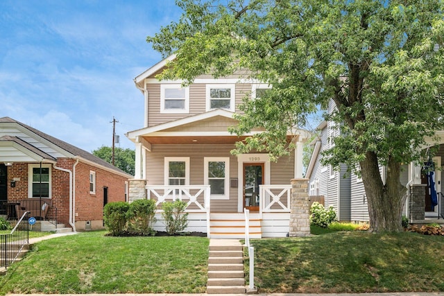 1293 Avondale Ave, Columbus, OH 43212 - view of front of home featuring covered porch and a front lawn