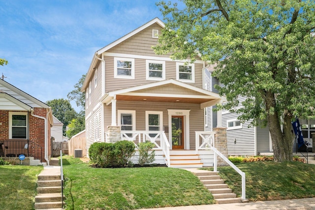 1293 Avondale Ave, Columbus, OH 43212 - traditional style home with a porch, a front yard, and stairway