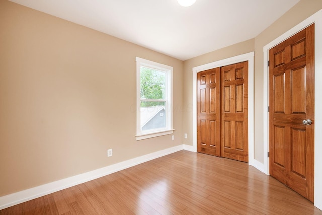 1293 Avondale Ave, Columbus, OH 43212 - unfurnished bedroom with light wood-type flooring and a closet