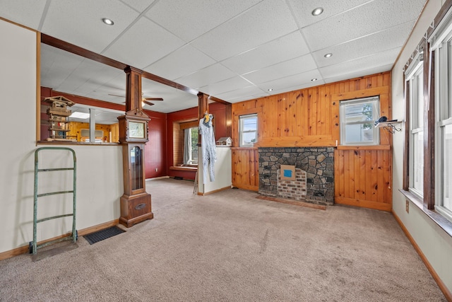 716 Uncapher Ave, Marion, OH 43302 - unfurnished living room featuring wood walls, carpet floors, ceiling fan, and recessed lighting