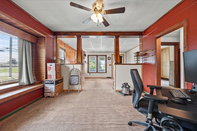 716 Uncapher Ave, Marion, OH 43302 - home office with ornate columns, light carpet, ceiling fan, and wood walls