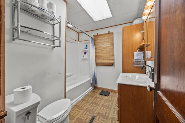 716 Uncapher Ave, Marion, OH 43302 - bathroom featuring a paneled ceiling, vanity, and shower / tub combo with curtain