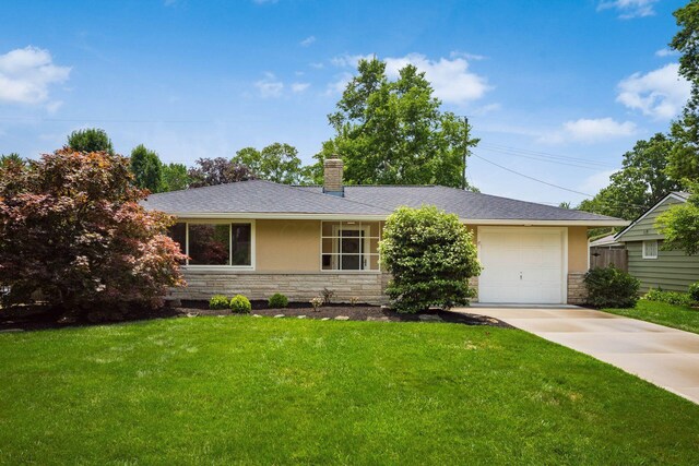 2269 Cranford Rd, Columbus, OH 43221 - ranch-style home featuring stone siding, concrete driveway, a front lawn, and a chimney