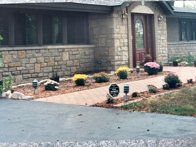 3535 Polley Rd, Columbus, OH 43221 - property entrance featuring stone siding