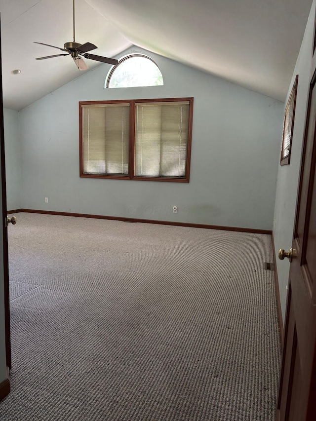 3535 Polley Rd, Columbus, OH 43221 - unfurnished room featuring carpet floors, lofted ceiling, and a ceiling fan
