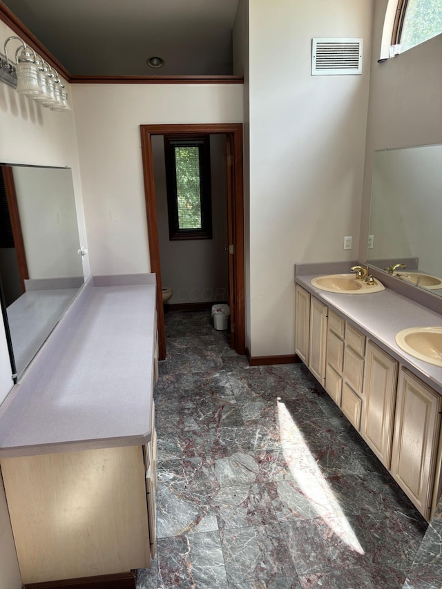 3535 Polley Rd, Columbus, OH 43221 - bathroom with double vanity and marble finish floors