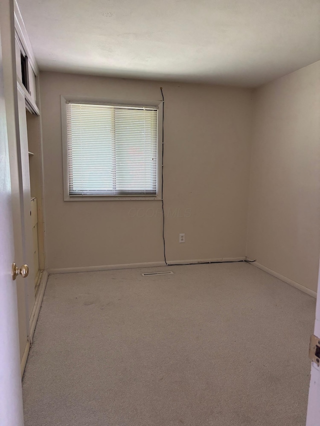 3535 Polley Rd, Columbus, OH 43221 - unfurnished bedroom featuring light colored carpet