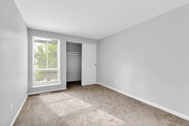 1030 Galliton Ct Unit B, Columbus, OH 43220 - unfurnished bedroom featuring carpet floors and a closet