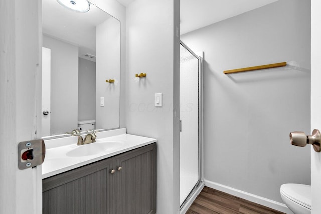 1030 Galliton Ct Unit B, Columbus, OH 43220 - bathroom with wood finished floors, a shower stall, and vanity