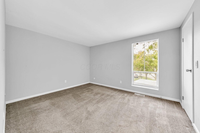 1030 Galliton Ct Unit B, Columbus, OH 43220 - carpeted empty room with baseboards