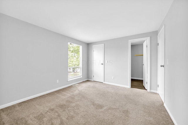 1030 Galliton Ct Unit B, Columbus, OH 43220 - unfurnished bedroom featuring carpet and baseboards